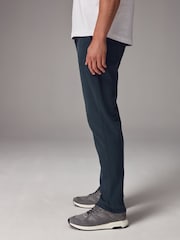 Темно-синий - Брюки-чиносы Slim Fit Motionflex - Изображение 3 из 11
