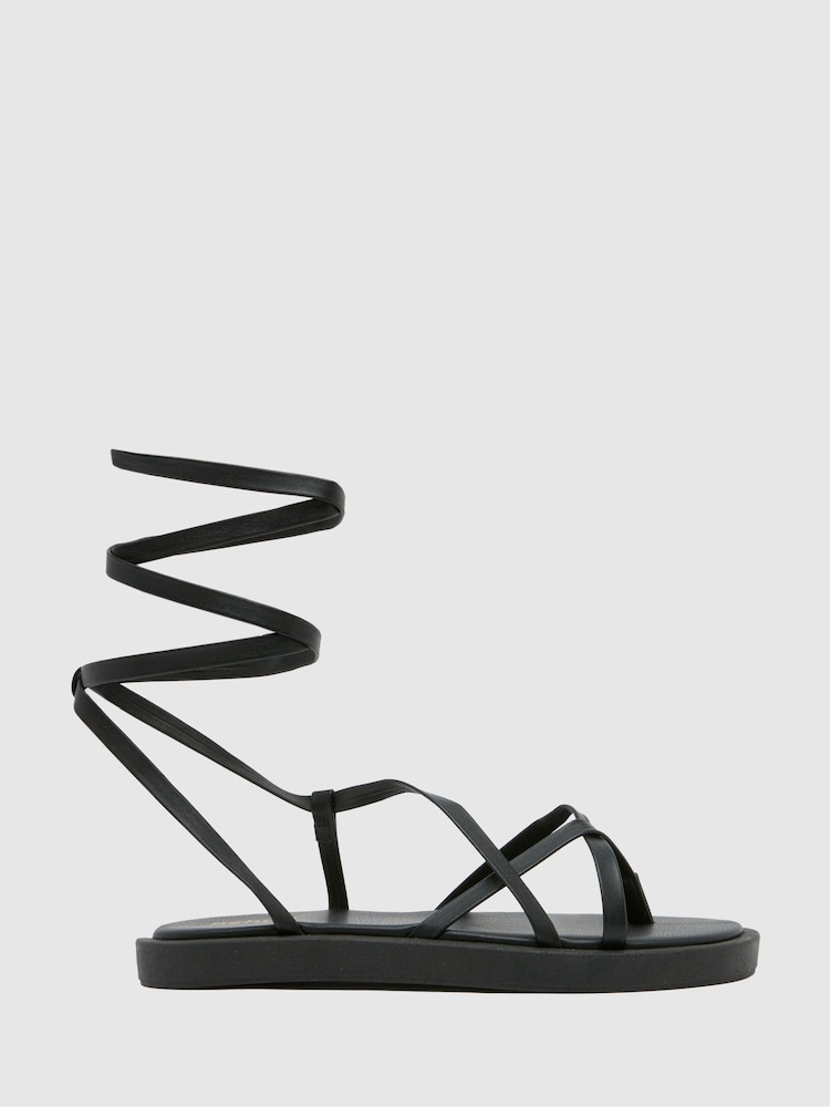 Schuh Terry Toe Loop Strappy Black Sandals - Image 1 of 3