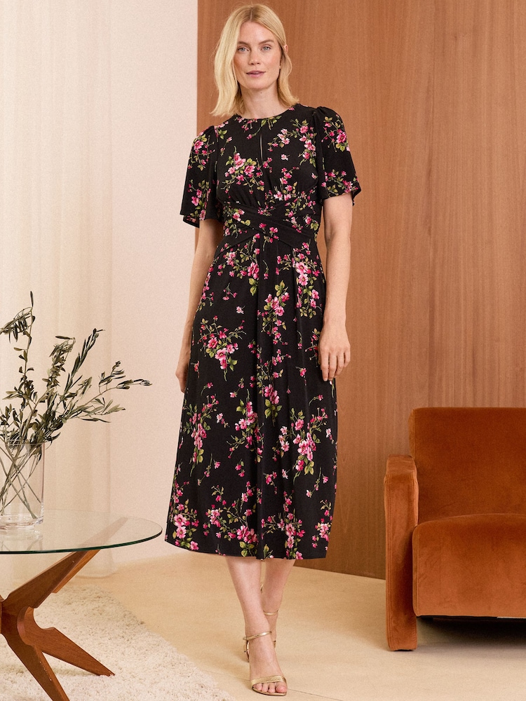 Love & Roses Black and Pink Floral Flutter Sleeve Wrap Front Jersey Midi Dress - Image 1 of 4