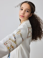 كريمي ـ سترة مُزيَّنة بطبعة Varsity من Baker By Ted Baker - صورة 4 من 11