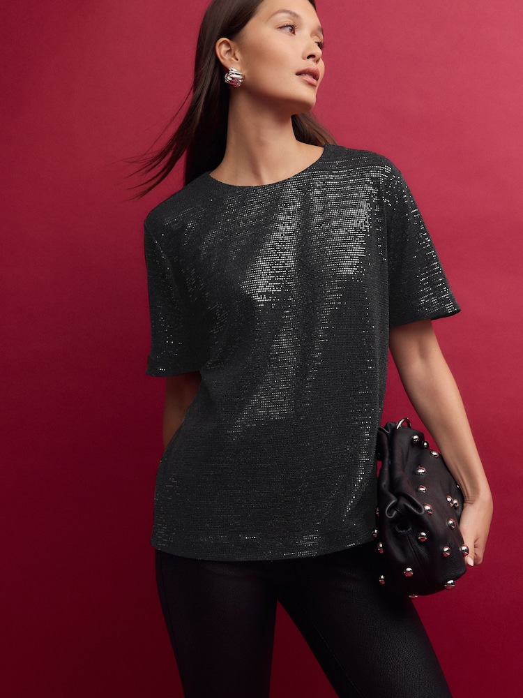 Schwarz - T-Shirt mit Pailletten - Bild 1 von 7 Schwarz - T-Shirt mit Pailletten - Bild 1 von 7