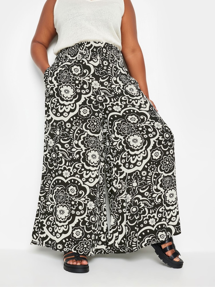 Yours Curve Black Floral Print Shirred Wide Leg Trousers - Image 1 of 5