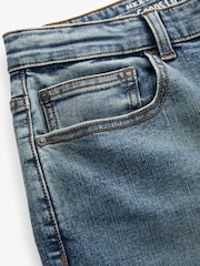 أزرق فاتح كلاسيكي - Regular Tapered Fit Classic Stretch Jeans - صورة 7 من 10
