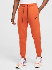 Oranžová - Funkčné flaušové tepláky Nike - Obrázok 1 z 8