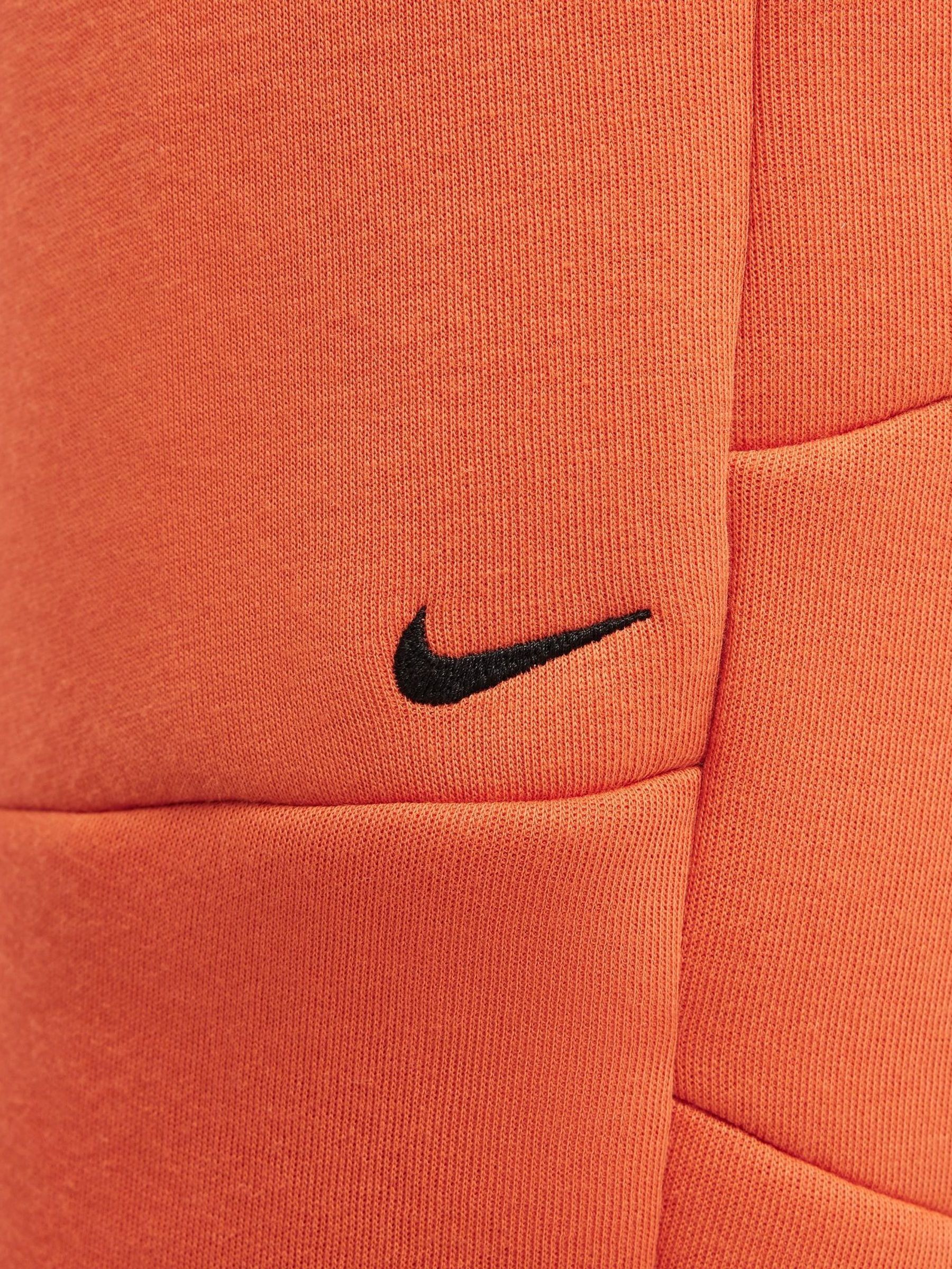 electro orange nike joggers