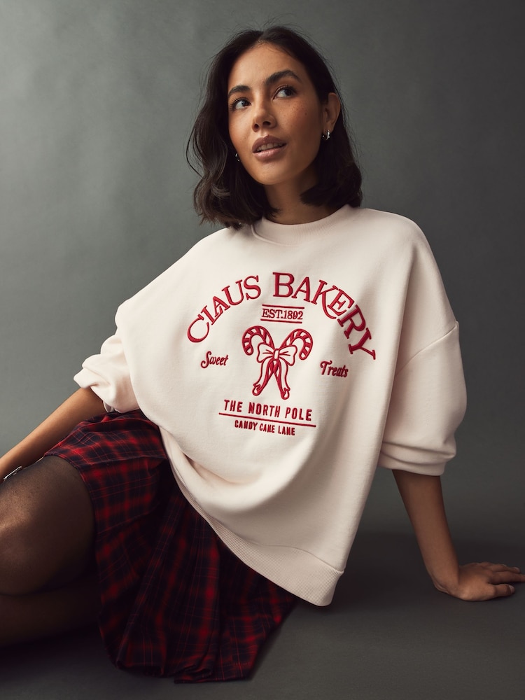 Red/Ecru Christmas Front Graphic Claus Bakery Crew Neck Sweatshirt - Image 1 of 7