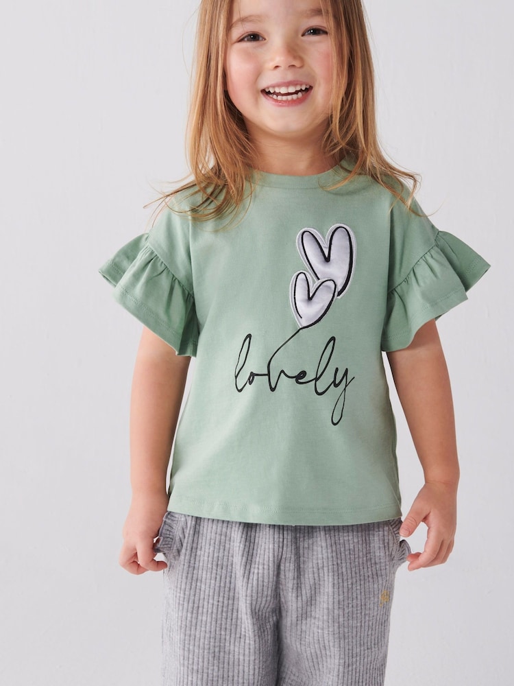 River Island Green Mini Girls Satin Heart Lovely T-Shirt - Image 1 of 4