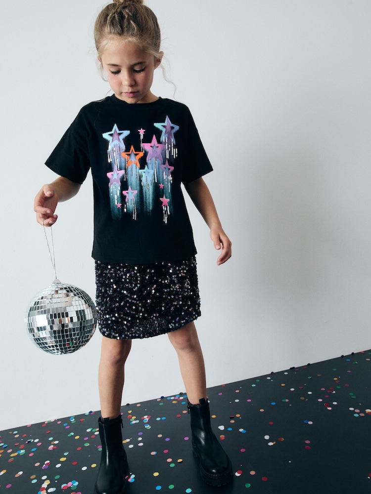 Schwarz - T-Shirt mit Pailletten und Sternmotiv aus 100 % Baumwolle (3–16 J.) - Bild 1 von 6 Schwarz - T-Shirt mit Pailletten und Sternmotiv aus 100 % Baumwolle (3–16 J.) - Bild 1 von 6