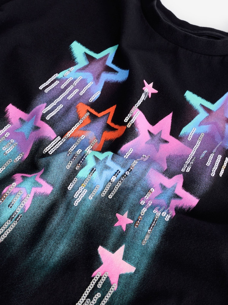 Schwarz - T-Shirt mit Pailletten und Sternmotiv aus 100 % Baumwolle (3–16 J.) - Bild 6 von 6 Schwarz - T-Shirt mit Pailletten und Sternmotiv aus 100 % Baumwolle (3–16 J.) - Bild 6 von 6