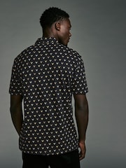 Black/Gold Reindeer Christmas Print Polo Shirt - Image 2 of 8