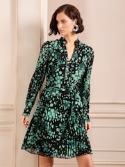Love & Roses Green Smudge Petite PU Trim V Neck Pleated Mini Dress - Image 1 of 4