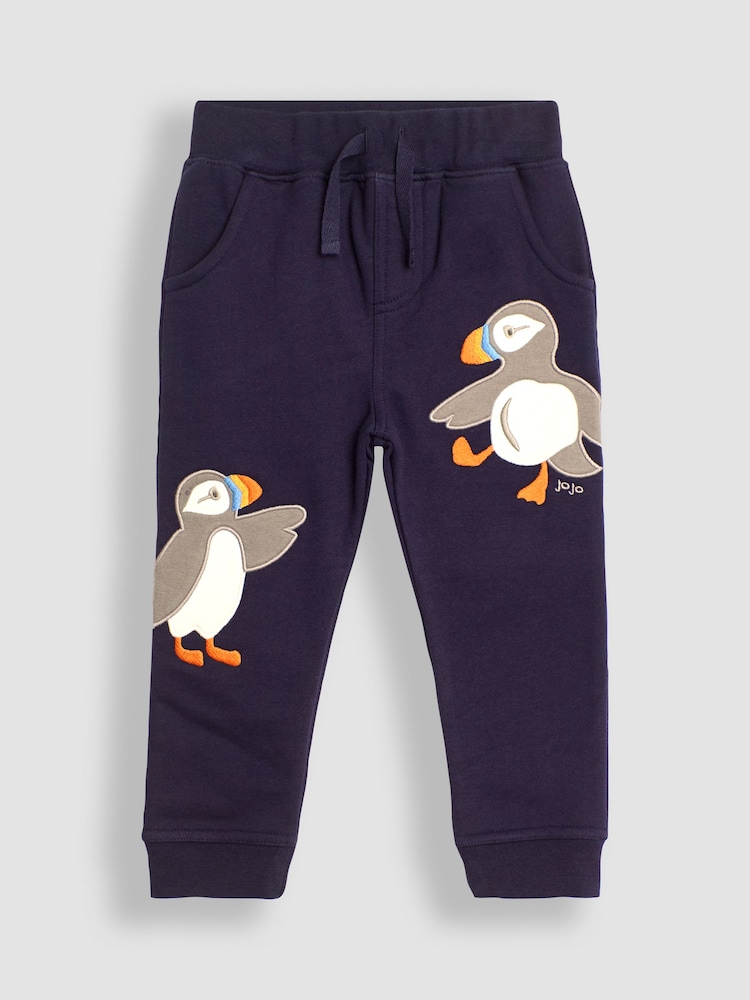 JoJo Maman Bébé Navy Blue Puffin Appliqué Pet in Pocket Joggers - Image 1 of 4 JoJo Maman Bébé Navy Blue Puffin Appliqué Pet in Pocket Joggers - Image 1 of 4