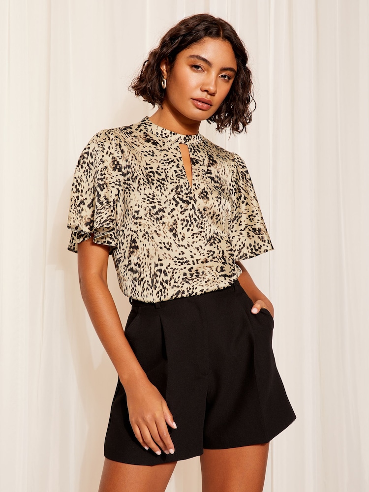 Friends Like These Pink Animal Printed Flutter Sleeve Keyhole Blouse - Image 1 of 4