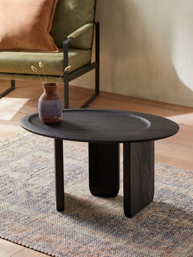 French Connection Black Mango Wood Ovate Coffee Table - Image 1 of 5