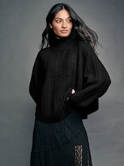 Black Cable Knitted Poncho Jumper with Wool - Image 1 of 8