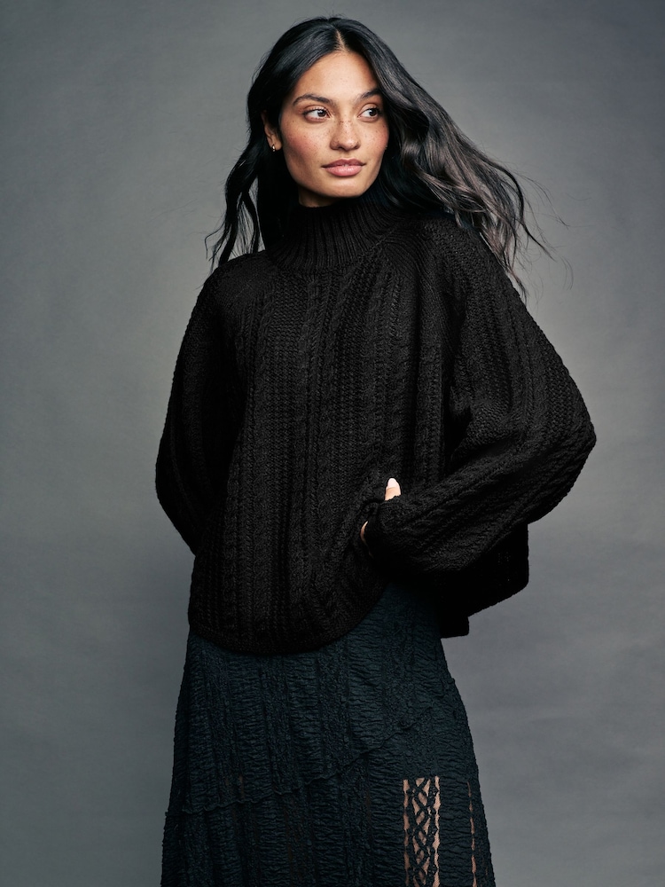 Black Cable Knitted Poncho Jumper with Wool - Image 1 of 8