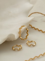 Orelia London 18k Gold Plating Pave Wave Huggie Hoops Earrings - Image 1 of 2
