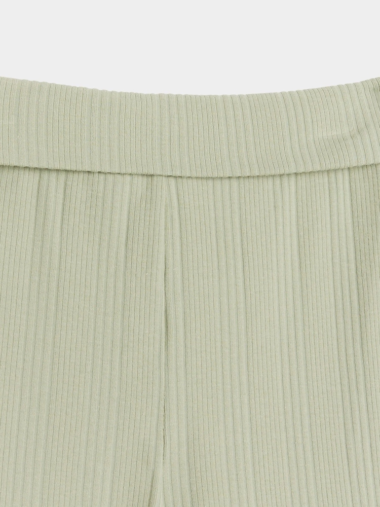 أخضر - بنطلون من القطن 100% بتصميم مضلع واسع من أسفل قابل للطي للبنات من River Island - صورة 3 من 3 أخضر - بنطلون من القطن 100% بتصميم مضلع واسع من أسفل قابل للطي للبنات من River Island - صورة 3 من 3