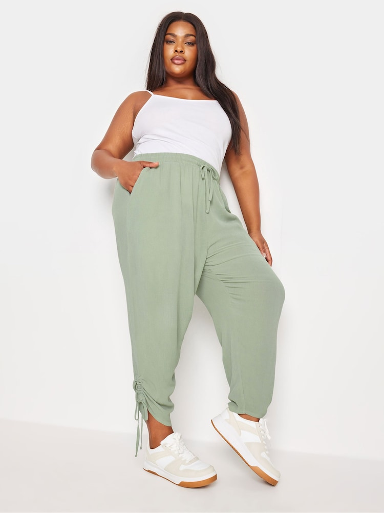 Yours Curve Green Crinkle Ruched Hem Cropped Trousers - Image 1 of 5