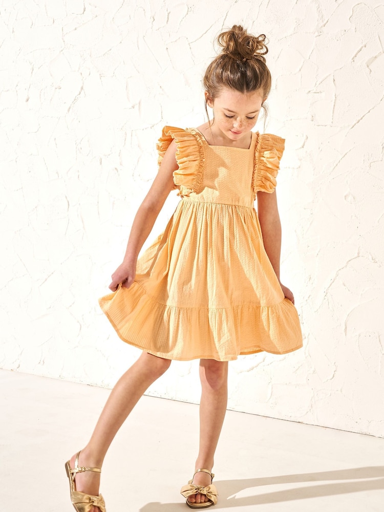 Angel & Rocket Orange 100% Cotton Simone Textured Ruffle Dress - Image 1 of 6 Angel & Rocket Orange 100% Cotton Simone Textured Ruffle Dress - Image 1 of 6