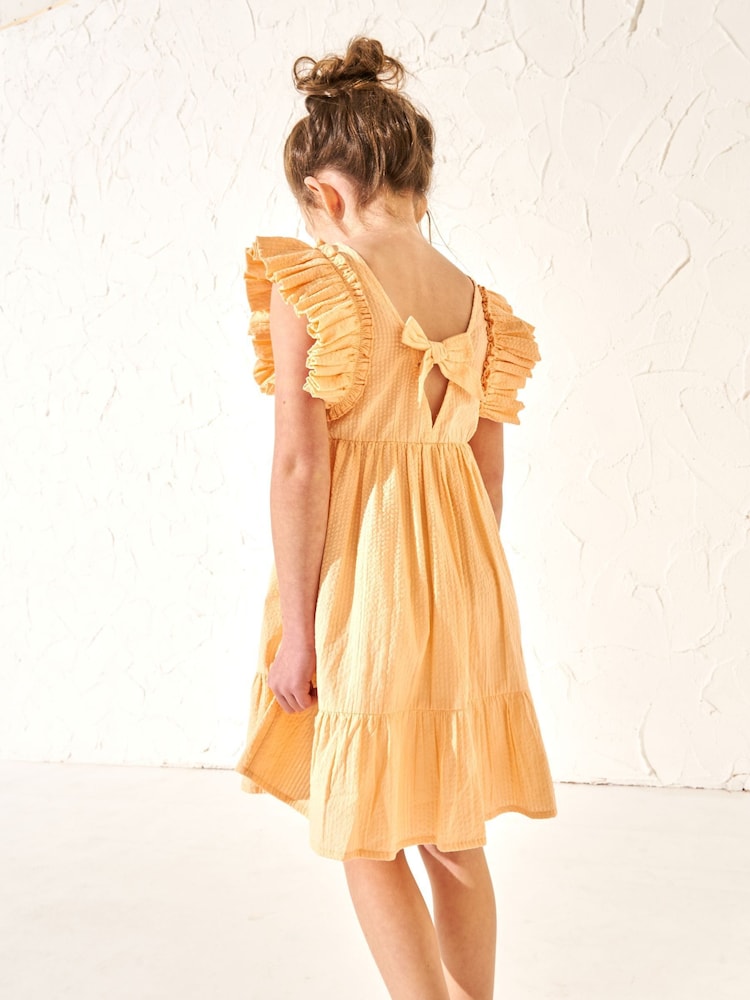 Angel & Rocket Orange 100% Cotton Simone Textured Ruffle Dress - Image 2 of 6 Angel & Rocket Orange 100% Cotton Simone Textured Ruffle Dress - Image 2 of 6
