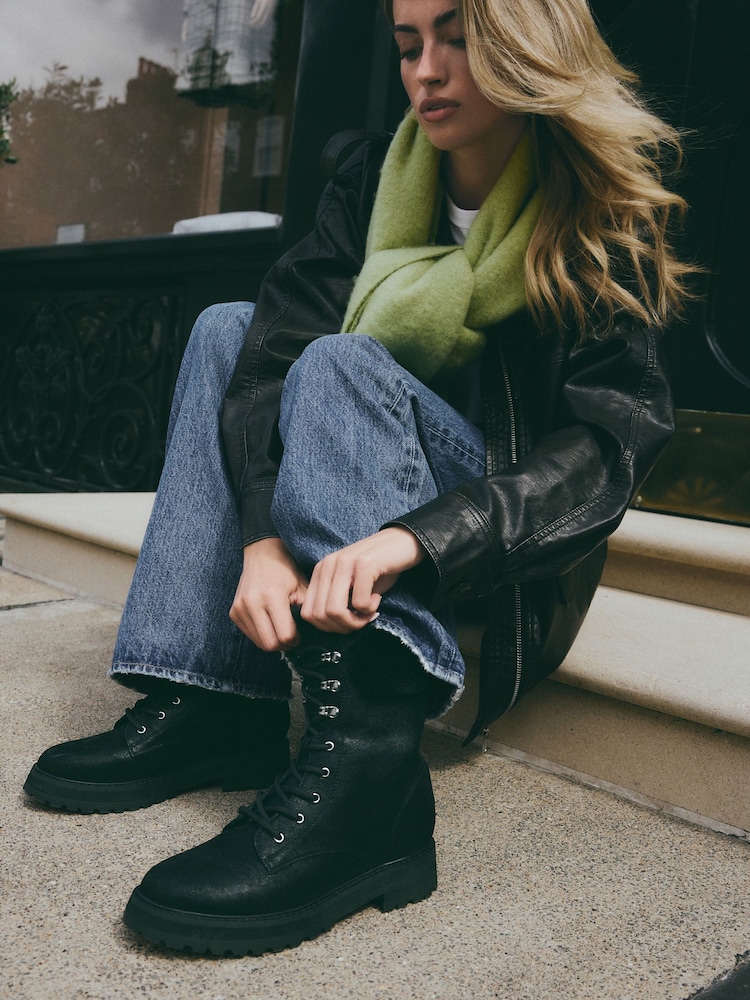 Black Forever Comfort® Faux Fur Collared Lace-Up Boots - Image 1 of 10