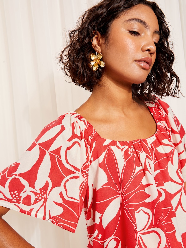 Friends Like These Red Floral Bardot Neck Flutter Sleeve Blouse - Image 2 of 4 Friends Like These Red Floral Bardot Neck Flutter Sleeve Blouse - Image 2 of 4
