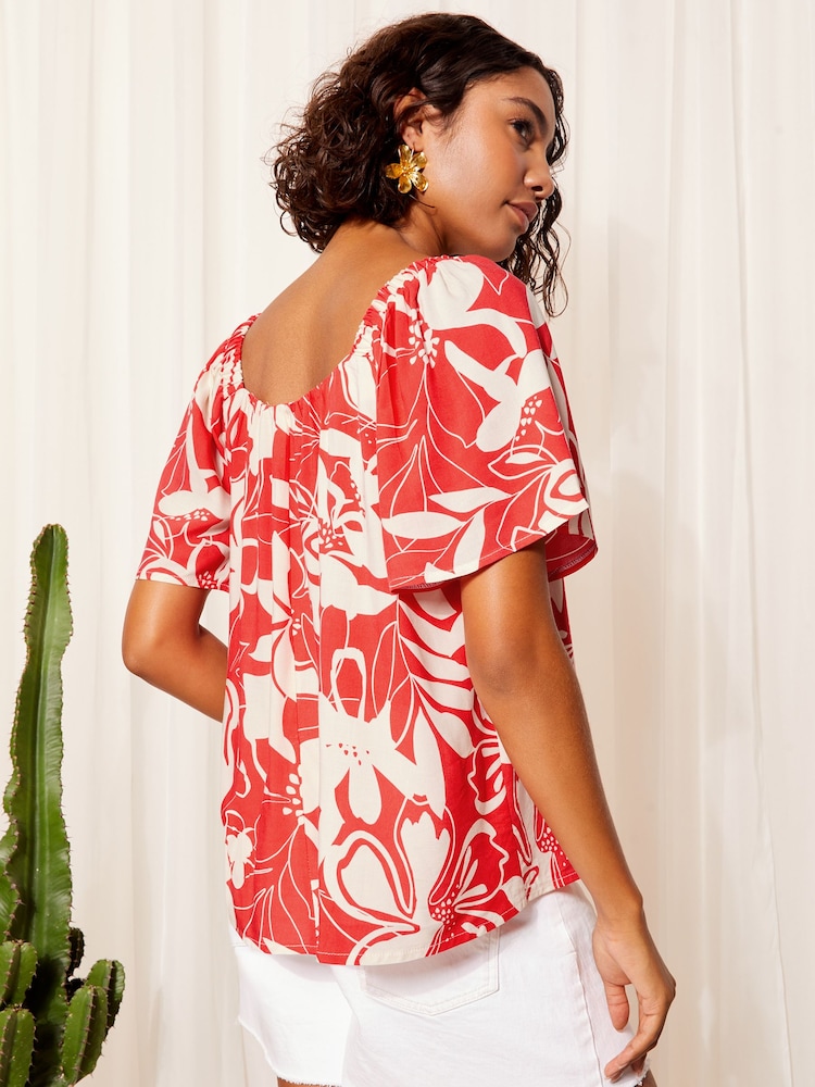 Friends Like These Red Floral Bardot Neck Flutter Sleeve Blouse - Image 4 of 4 Friends Like These Red Floral Bardot Neck Flutter Sleeve Blouse - Image 4 of 4