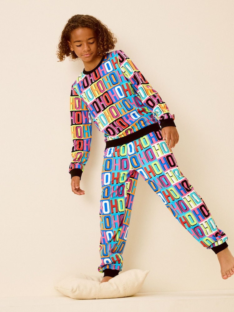 Multi Bright Single Soft Touch Christmas Fleece Pyjamas with Elastane (9mths-16yrs) - Image 1 of 7 Multi Bright Single Soft Touch Christmas Fleece Pyjamas with Elastane (9mths-16yrs) - Image 1 of 7