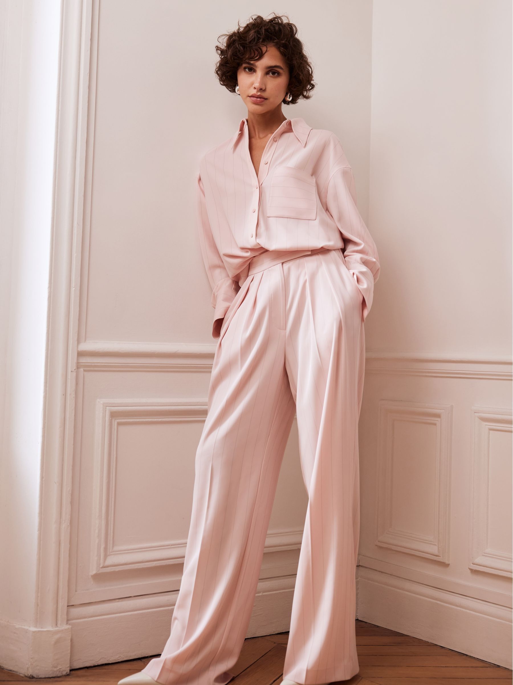 Pink pinstripe trousers on sale