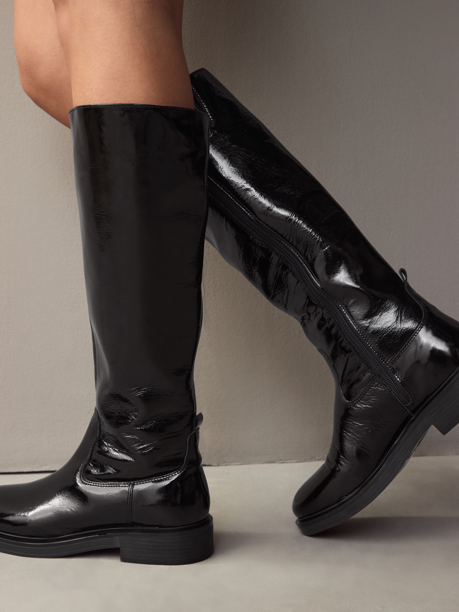 Buy Black Patent Forever Comfort® Leather Rider Knee High