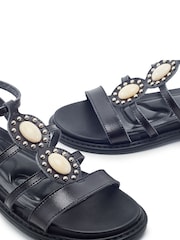 أسود - صندل بنعل مسطح ومرصع بأحجار من تشكيلة Lysandra من Moda in Pelle - صورة 3 من 4