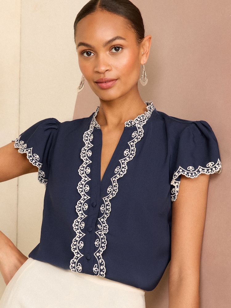 Love & Roses Navy Blue Satin Ruffle Trim V Neck Flutter Sleeve Blouse - Image 1 of 4 Love & Roses Navy Blue Satin Ruffle Trim V Neck Flutter Sleeve Blouse - Image 1 of 4