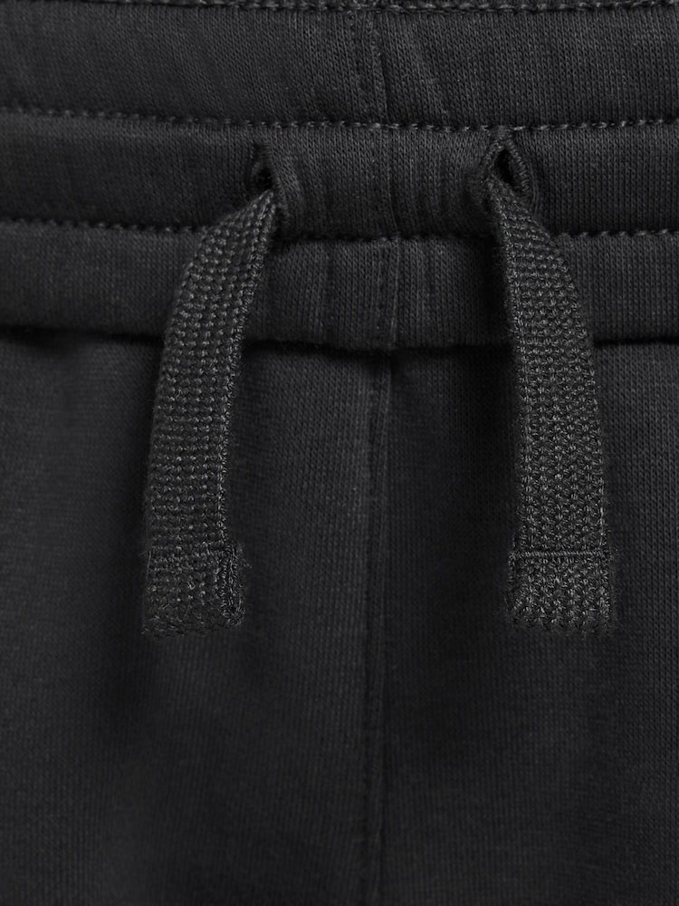 Черный - Флисовые джоггеры с логотипом Nike Club - Изображение 7 из 7