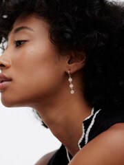 Oliver Bonas White Faux Fur Pearl Flower Drop Huggie Rosaria Earrings - Image 5 of 5