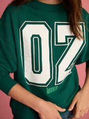 Forest Green Official Wicked Movie License Oz Varsity Green Crewneck Sweatshirt - Image 4 of 7