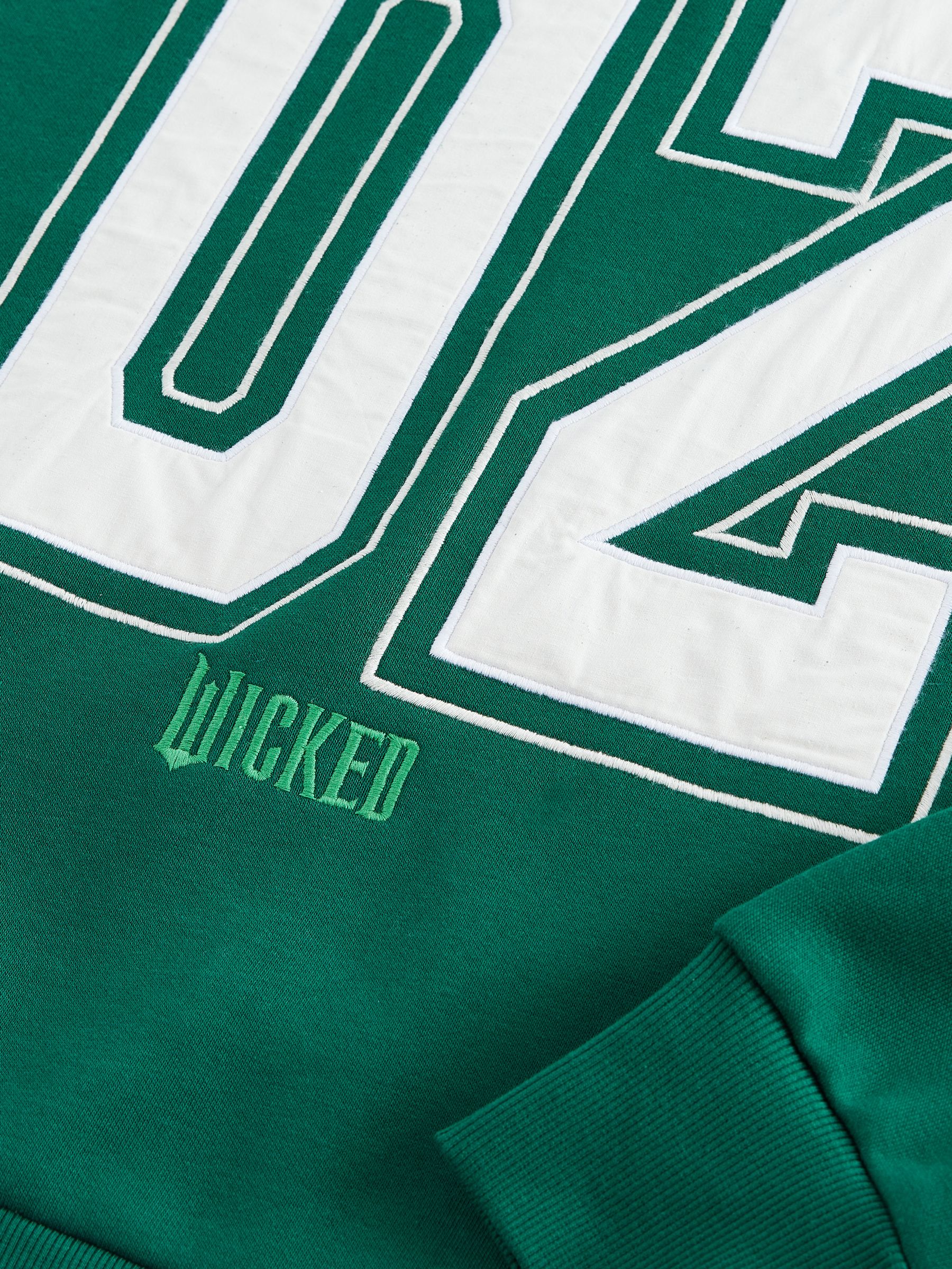 Buy Forest Green Official Wicked Movie License Oz Varsity