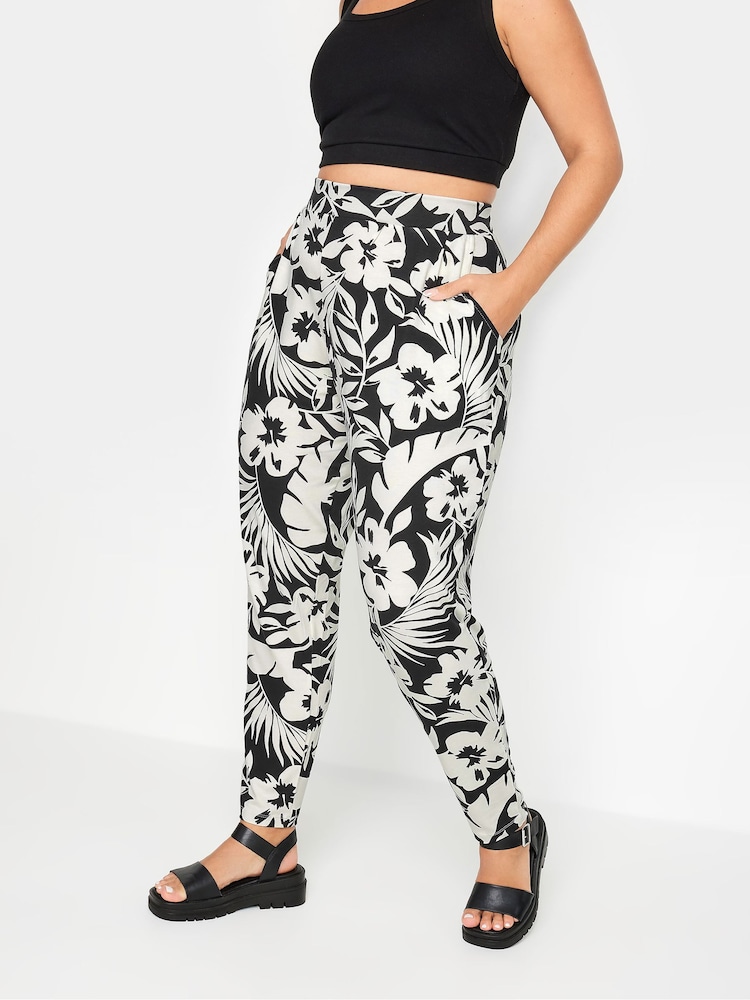 Yours Curve Black & White Tropical Print Harem Trousers - Image 1 of 5 Yours Curve Black & White Tropical Print Harem Trousers - Image 1 of 5
