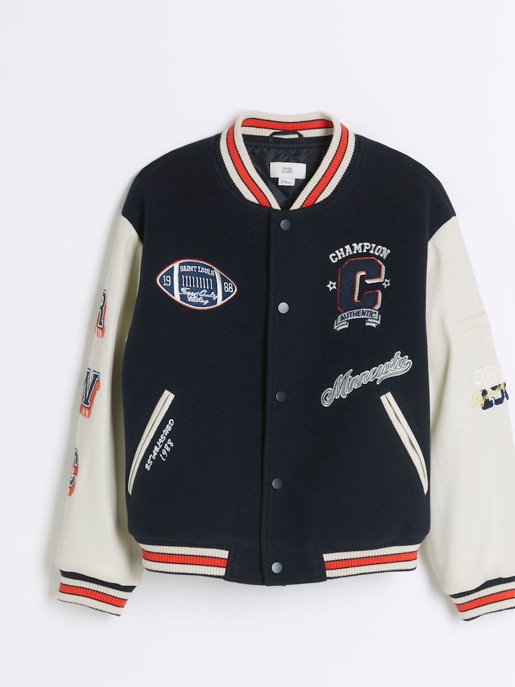 River Island Black Boys Mono Varsity Bomber Jacket - Image 1 of 3 River Island Black Boys Mono Varsity Bomber Jacket - Image 1 of 3