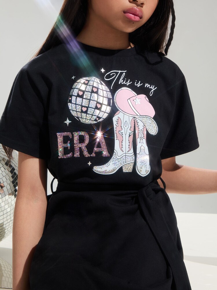 Lipsy Black Era Graphic T-Shirt Dress (4-14yrs) - Image 1 of 4