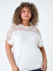 Roman White Lace Yoke Stretch Bubble Hem Top - Image 1 of 5