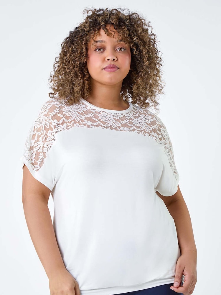 Roman White Lace Yoke Stretch Bubble Hem Top - Image 1 of 5
