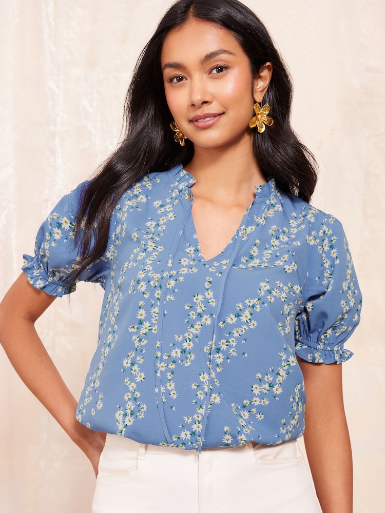 Friends Like These Blue Floral Short Sleeve Woven Tie Neck Blouse - Image 1 of 4