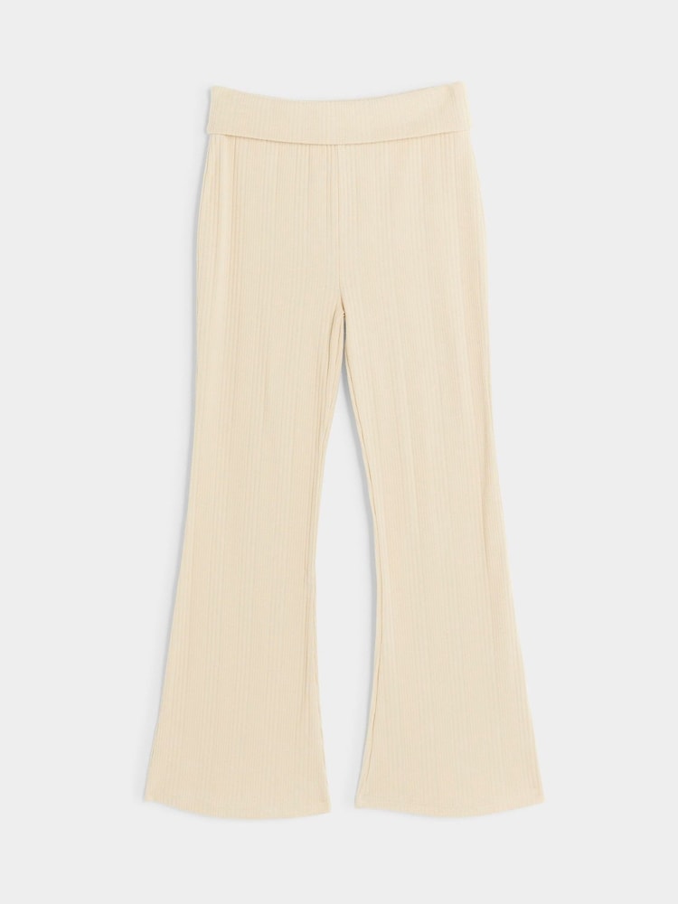 لون طبيعي - بنطلون من القطن 100% بتصميم مضلع واسع من أسفل قابل للطي للبنات من River Island - صورة 1 من 3 لون طبيعي - بنطلون من القطن 100% بتصميم مضلع واسع من أسفل قابل للطي للبنات من River Island - صورة 1 من 3