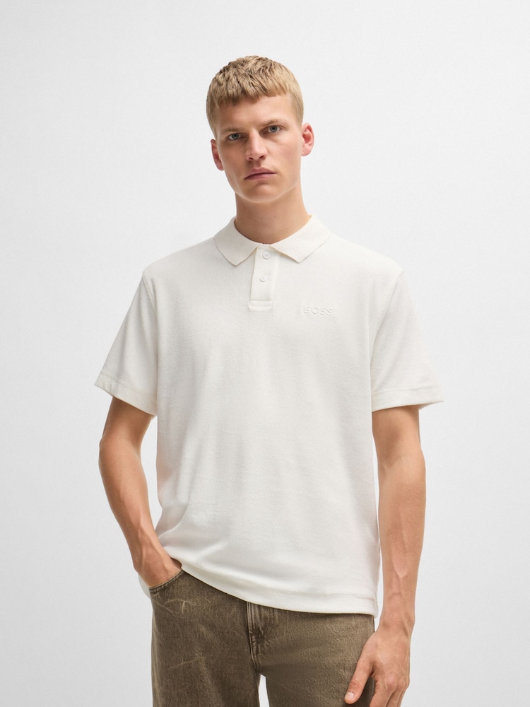 BOSS White Cotton-Towelling Polo Shirt With Mixed-Technique Logo - Image 1 of 5 BOSS White Cotton-Towelling Polo Shirt With Mixed-Technique Logo - Image 1 of 5