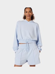 Sweaty Betty Breeze Blue Sand Wash CloudWeight Crop Hoodie - Image 1 of 5