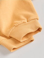 León amarillo - Conjunto de sudadera y pantalones de chándal para bebé - Imagen 10 de 11