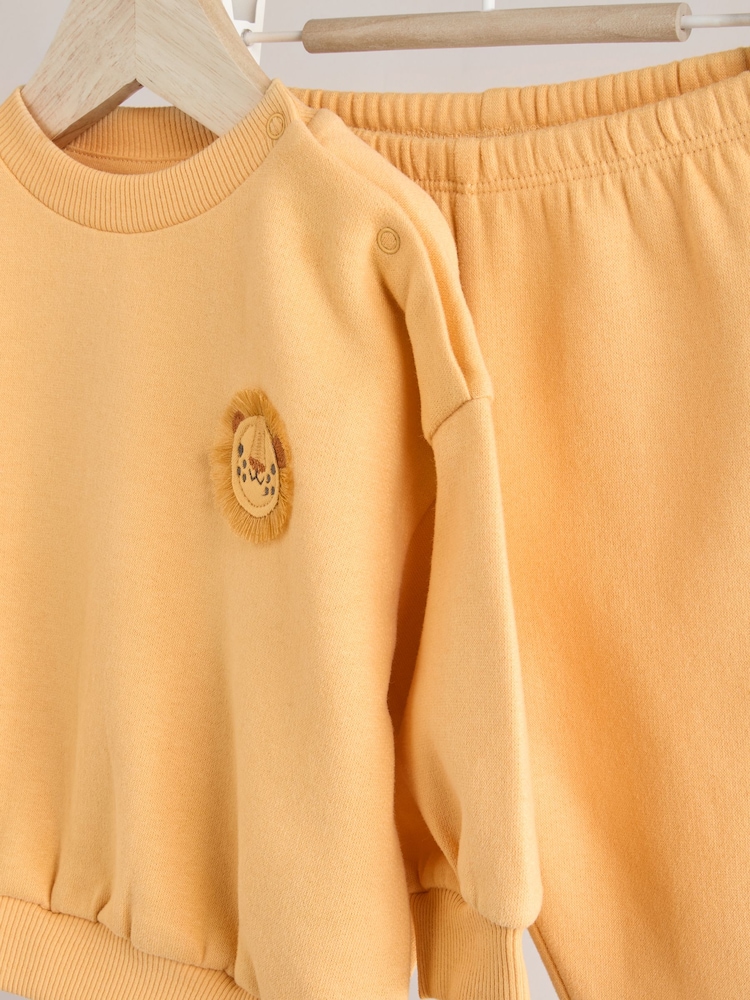 León amarillo - Conjunto de sudadera y pantalones de chándal para bebé - Imagen 11 de 11