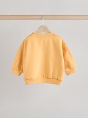 León amarillo - Conjunto de sudadera y pantalones de chándal para bebé - Imagen 2 de 11