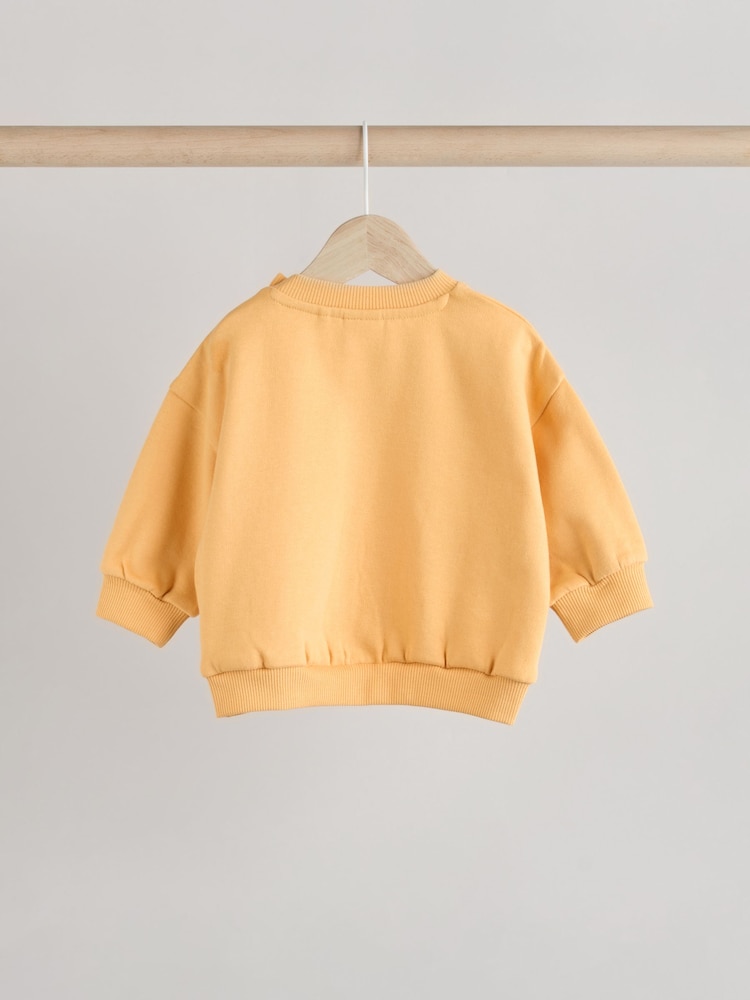 León amarillo - Conjunto de sudadera y pantalones de chándal para bebé - Imagen 2 de 11